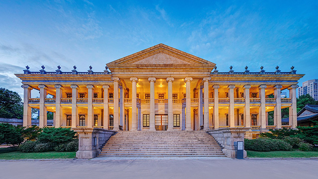 Seokjojeon Hall at Deoksugung Palace, Western neo-classical style building with Ionic columns and symmetrical stone facade, representing Korean Empire modernization