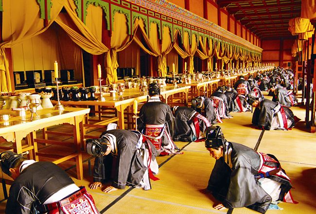 Jongmyo Jeongjeon Hall interior showing wooden spirit tablet chambers housing Joseon Dynasty kings and queens, austere Confucian shrine architecture