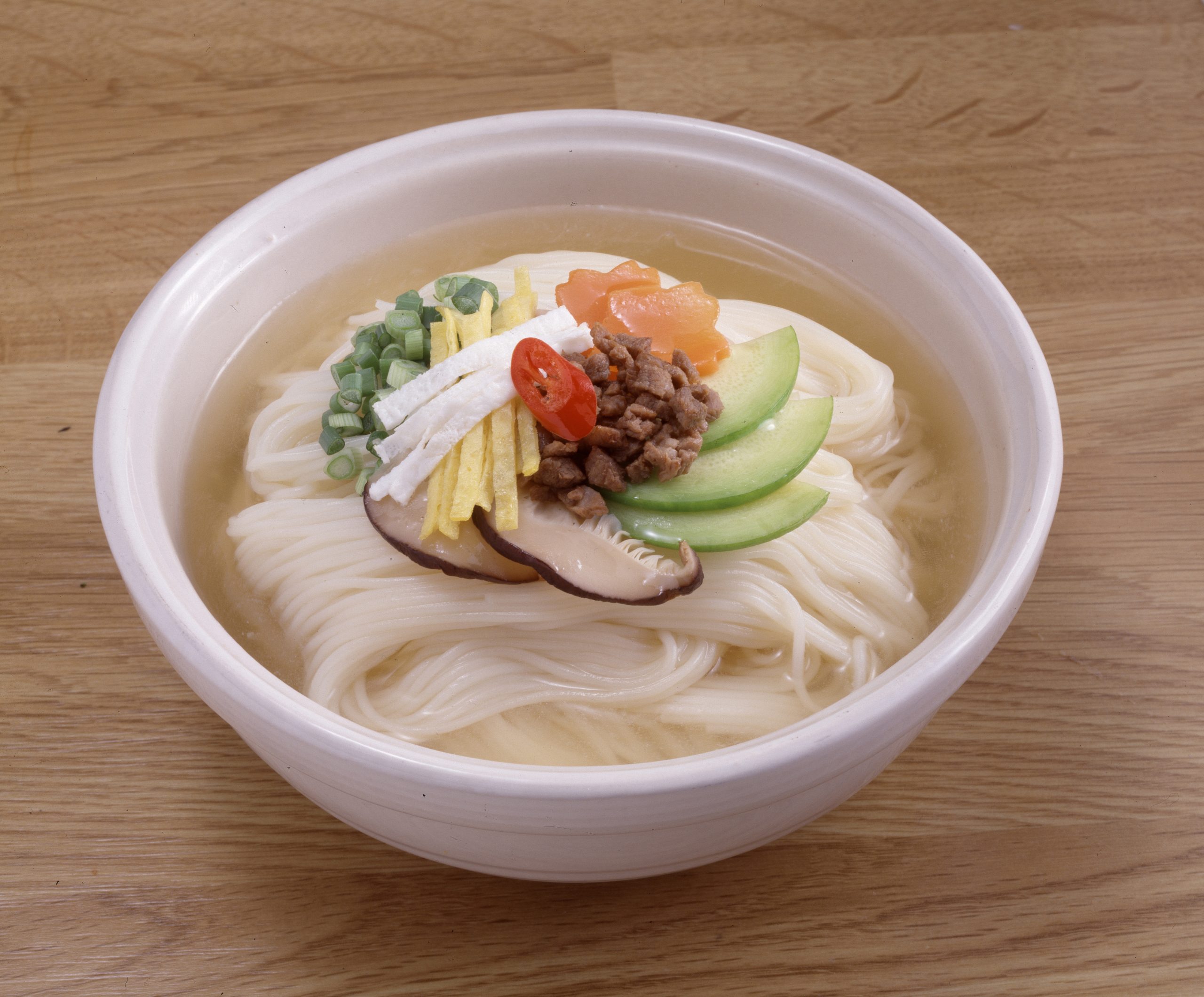 Korean noodle encyclopedia showing variety of traditional Korean noodle dishes including naengmyeon, janchi-guksu, and other Korean noodle specialties
